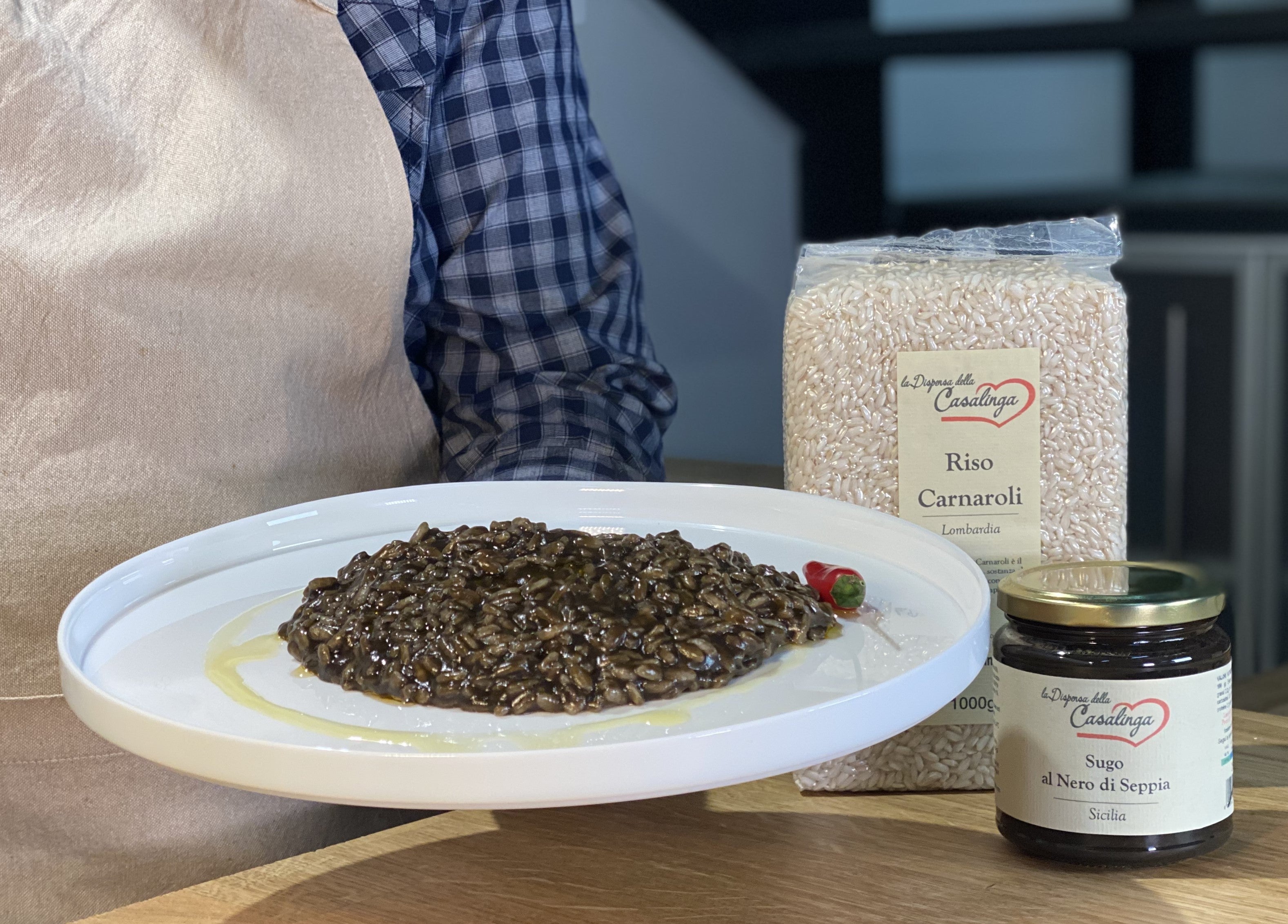 Collezione risotto con sugo al nero di seppia